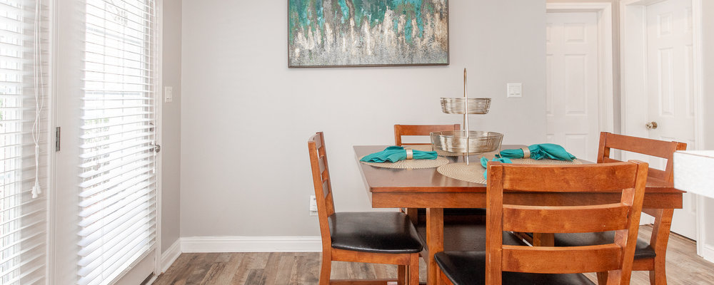 Dining area with wood table and chairs